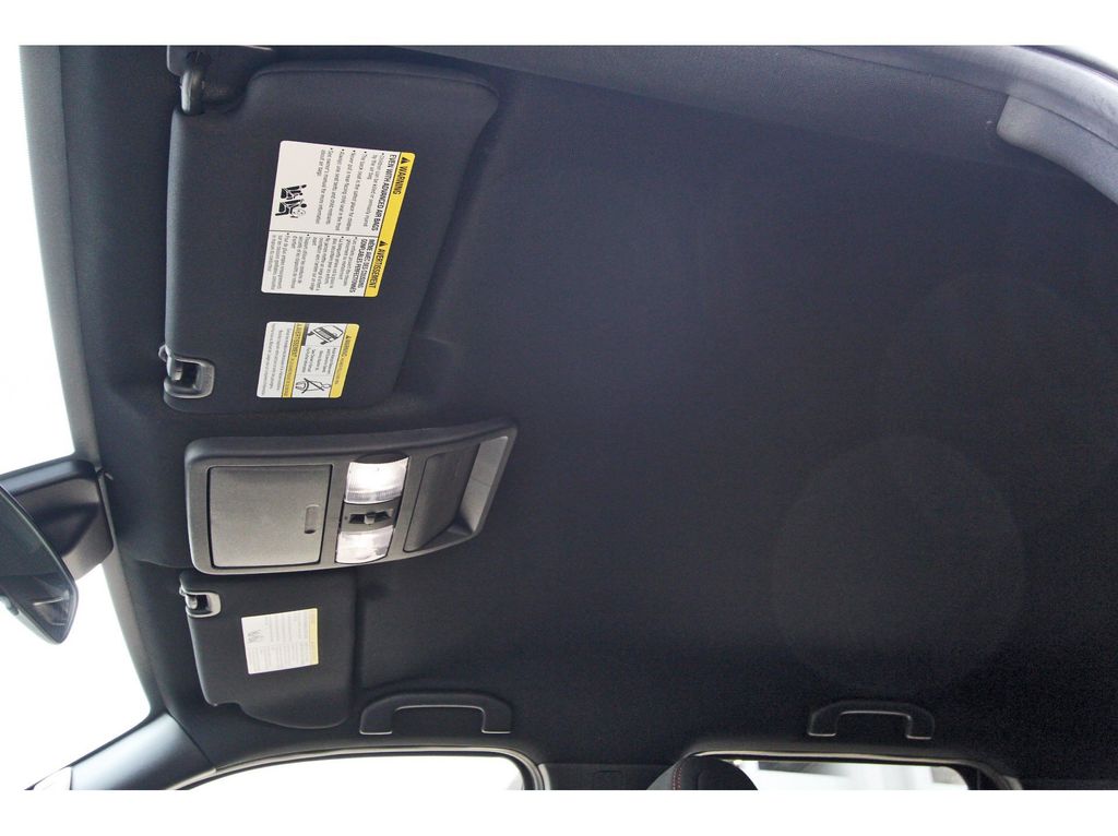 2025 Nissan Frontier PRO-4X Red at Bravo Nissan