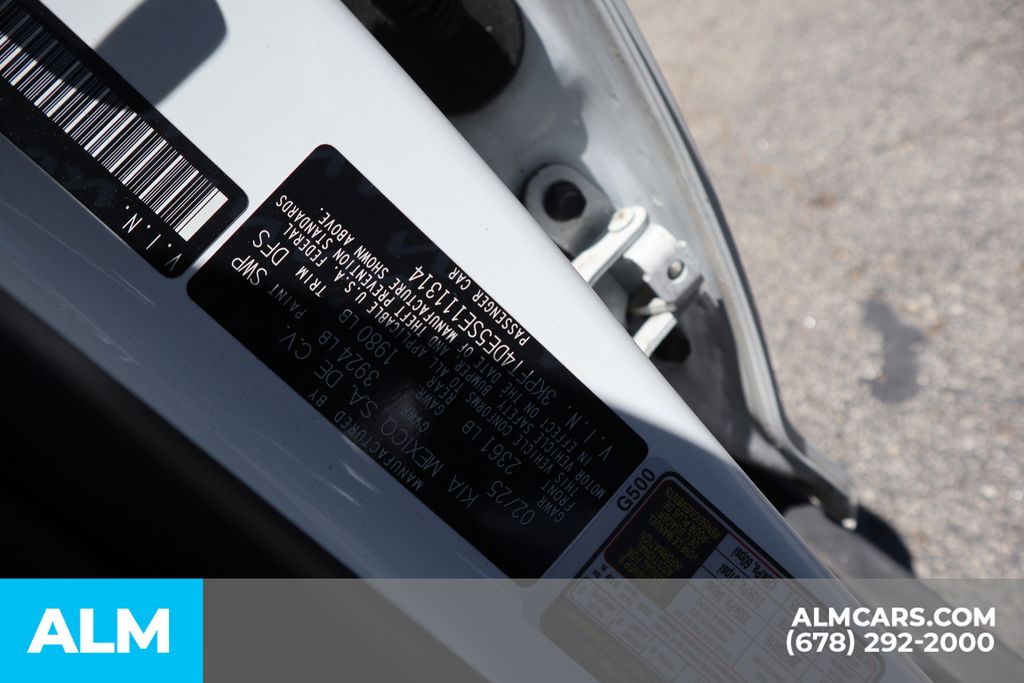 Used 2025 White Kia LXS image 37