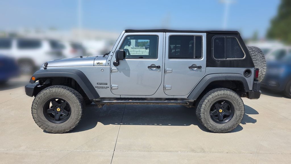 Used 2015 Jeep Wrangler Unlimited Sport with VIN 1C4BJWDG2FL506744 for sale in Kansas City