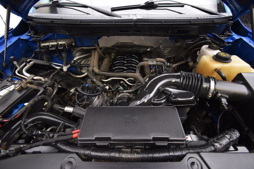 used 2013 Ford F-150 car, priced at $12,000