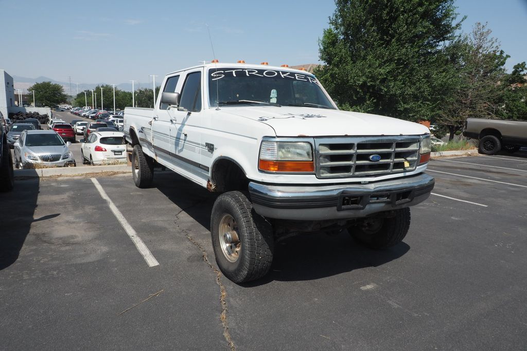 Silver 1995 Ford F-350 Pickup Truck Four-Wheel Drive