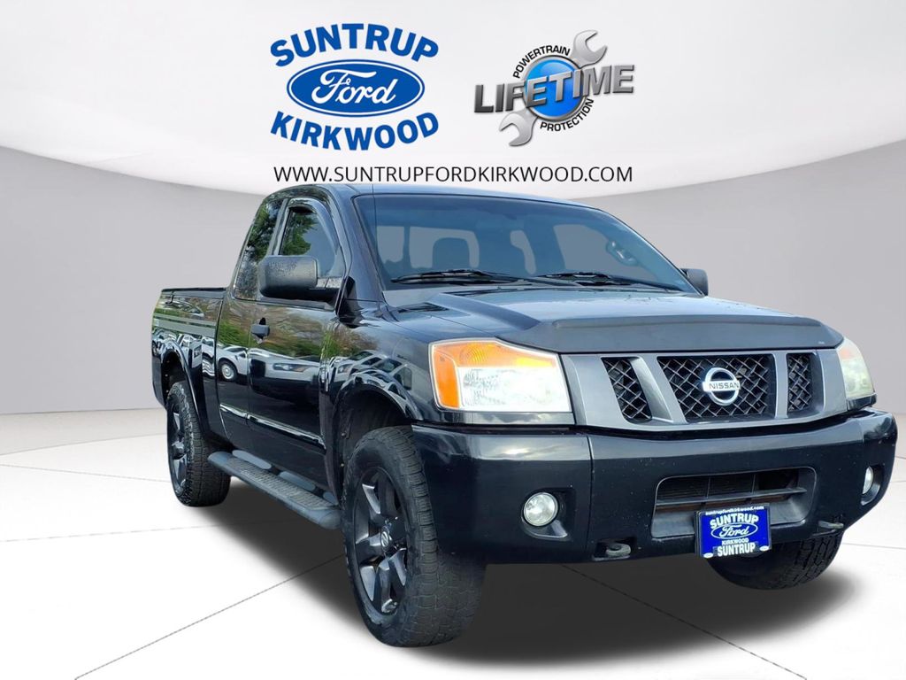 Galaxy Black Metallic 2012 Nissan Titan SV King Cab 4WD Pickup Truck Four-Wheel Drive 5-Speed Automatic