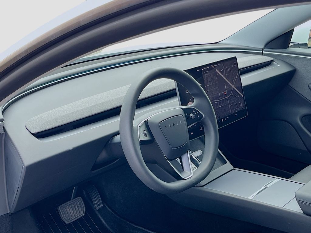 2025 Tesla Model 3 Long Range White at AutoSavvy Houston Northwest