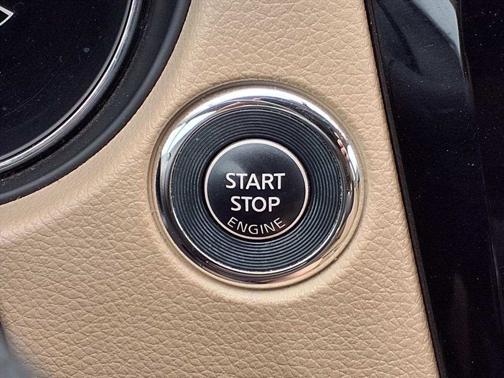 2016 Nissan Rogue SV Red at DeMontrond Gulf Freeway