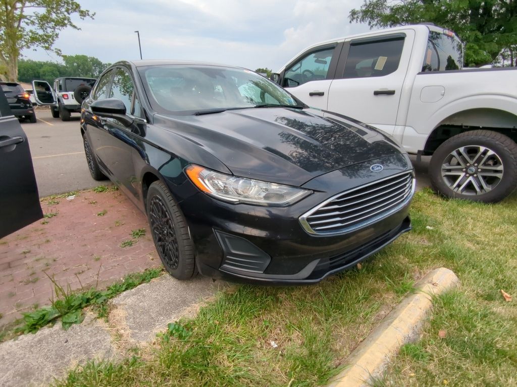 View vehicle photo 3