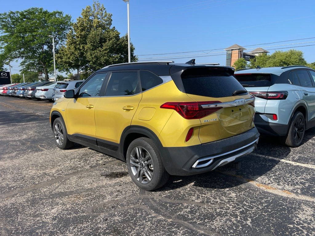 Certified Used 2023 Starbright Yellow/Black Roof Kia S image 2