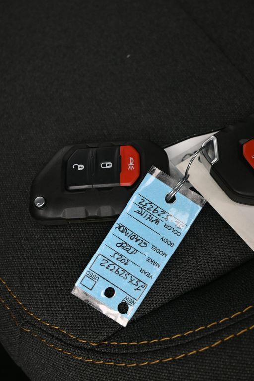 Used 2025 Bright White Clearcoat Jeep Sport image 16