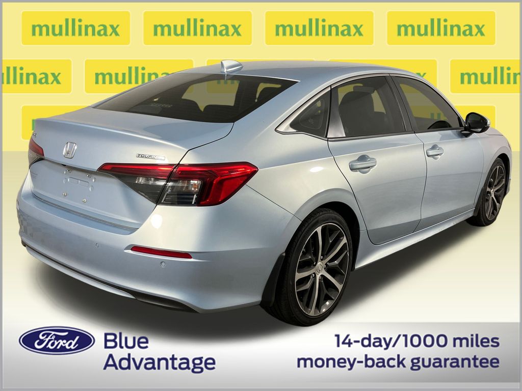 View vehicle photo 4