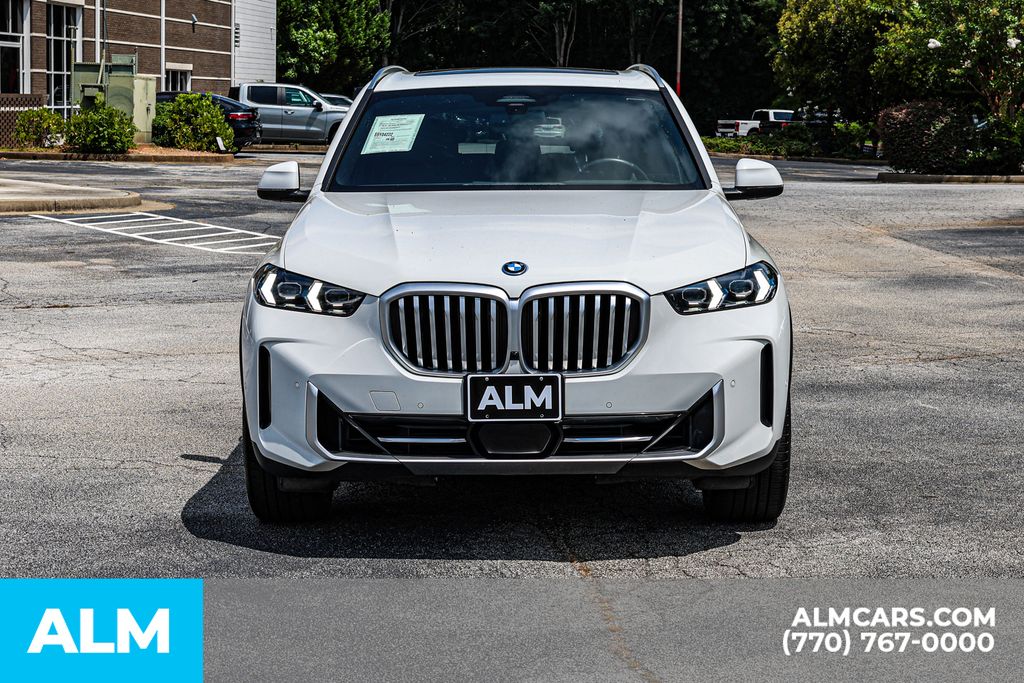 Used 2025 White BMW xDrive50e image 11