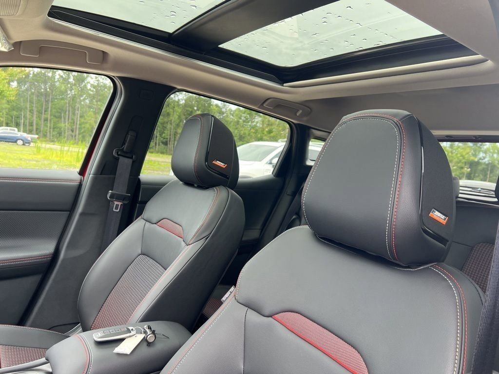 2025 Scarlet Ember Tintcoat Nissan Kicks SR FWD SUV