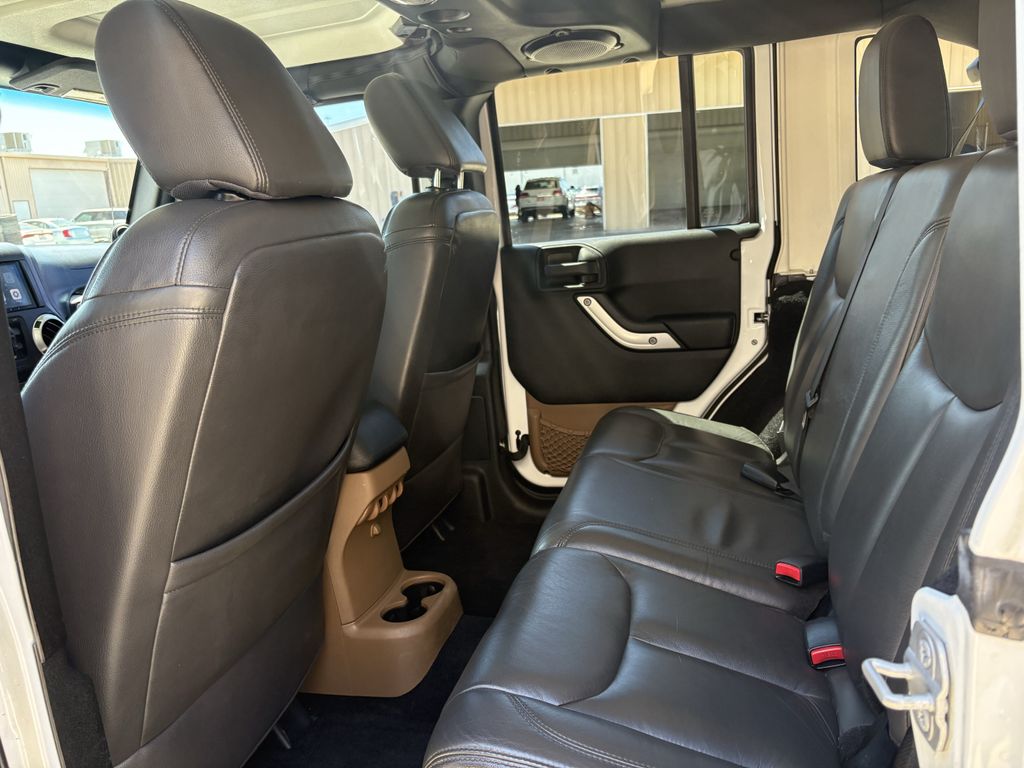 2014 Jeep Wrangler Unlimited Sahara White at Autostrade