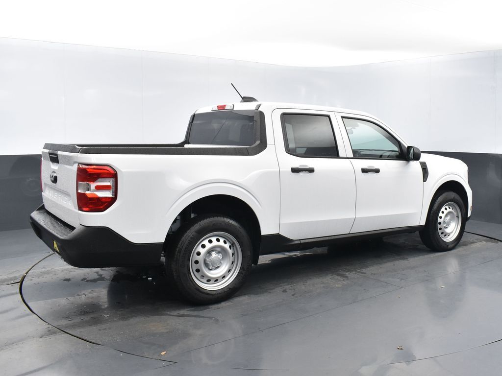 View vehicle photo 4