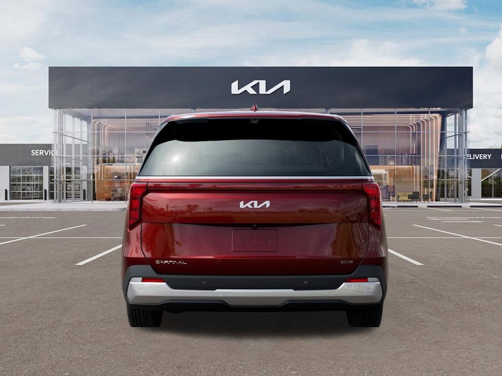 2026 Kia Carnival Hybrid EX AUTO Red at Joe Myers Mazda Kia