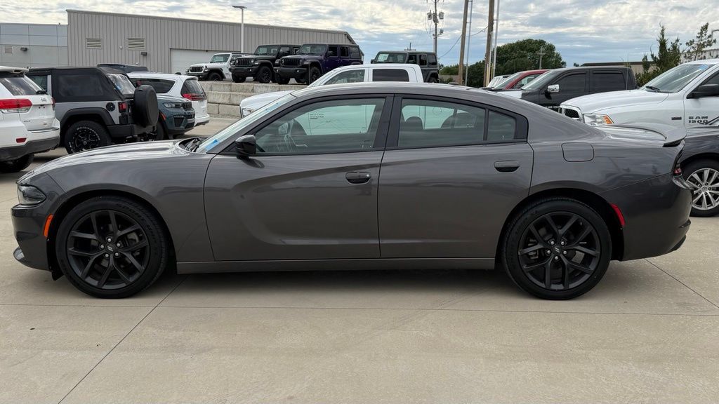 Used 2022 Dodge Charger SXT with VIN 2C3CDXBG9NH126224 for sale in Kansas City