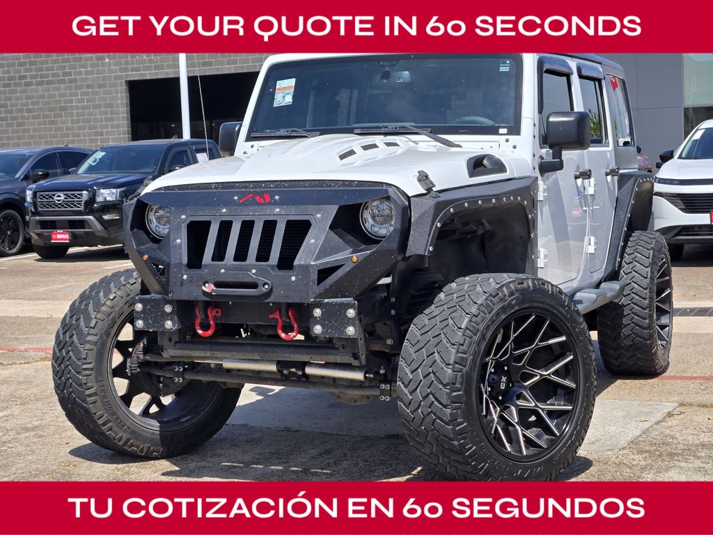 2015 Jeep Wrangler Unlimited Sahara White at DeMontrond Automotive Group