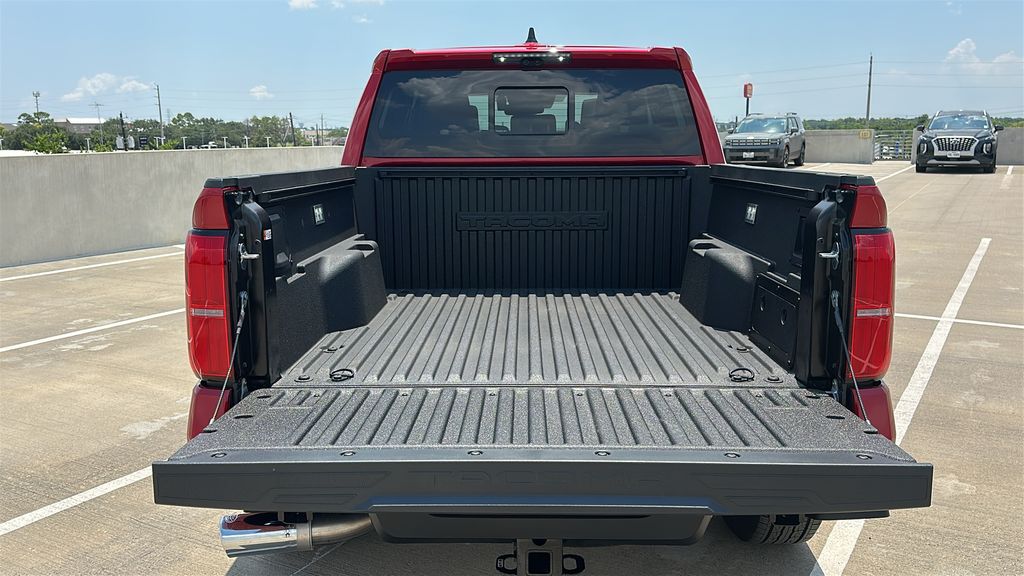 2026 Toyota Tacoma Hybrid Limited Red at EAG Ford Navasota