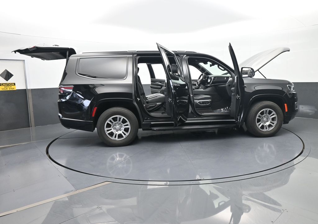 Used 2024 Diamond Black Crystal Pearlcoat Jeep Base image 67
