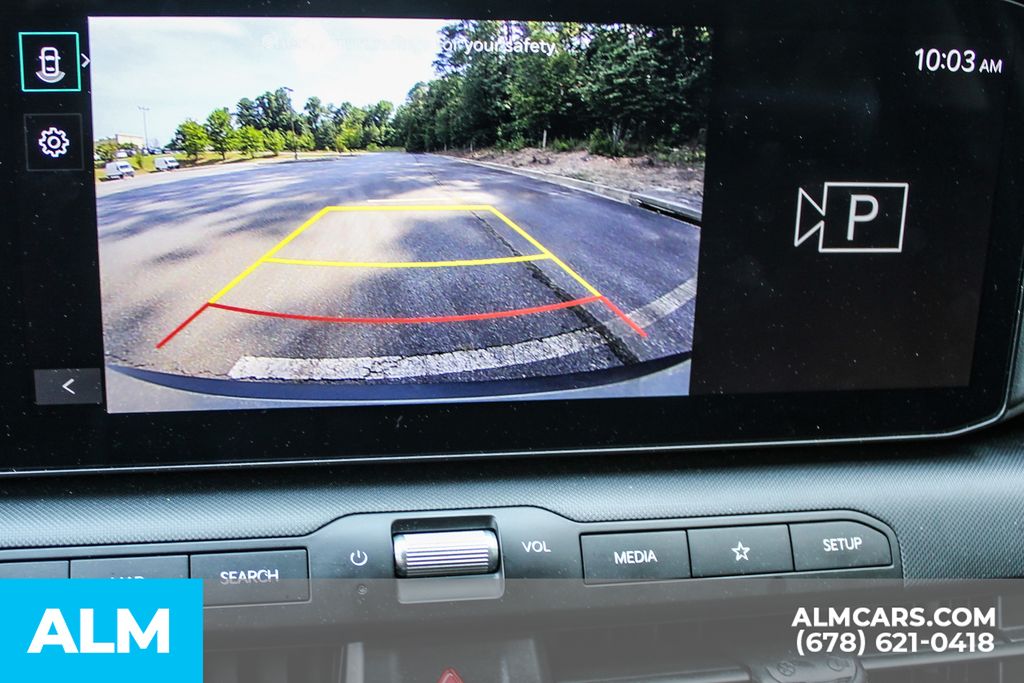 Used 2025 Blue Kia LXS image 32