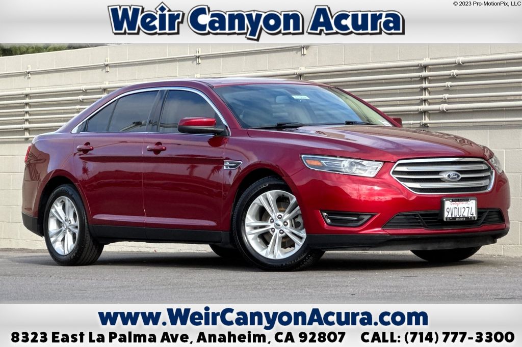 Ruby Red Metallic 2015 Ford Taurus SEL Sedan Front-Wheel Drive 6-Speed Automatic