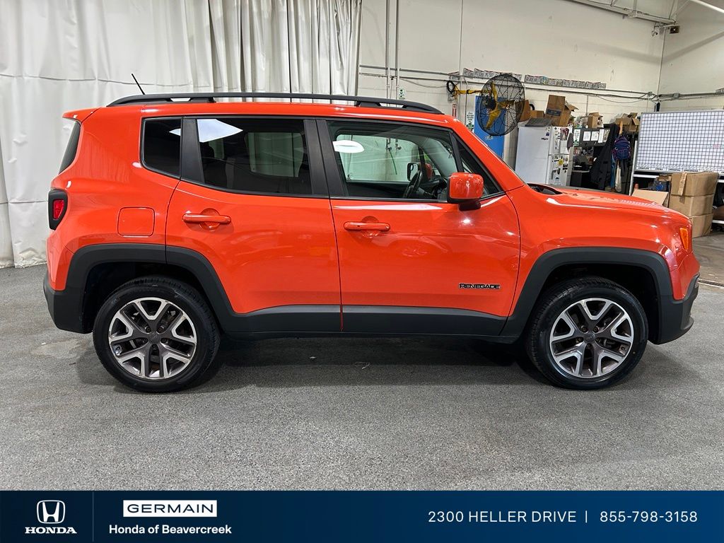 Used 2015 Orange Jeep Latitude image 9