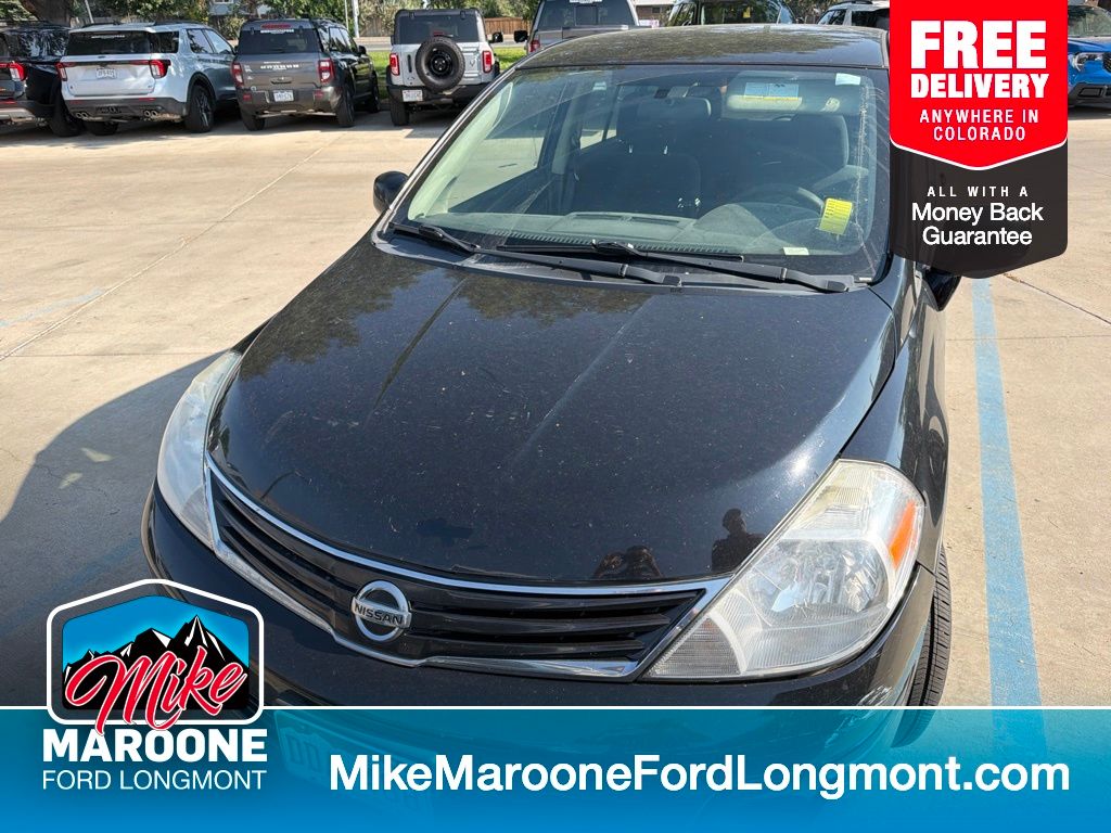 Super Black Metallic 2011 Nissan Versa Hatchback Front-Wheel Drive 6-Speed Manual