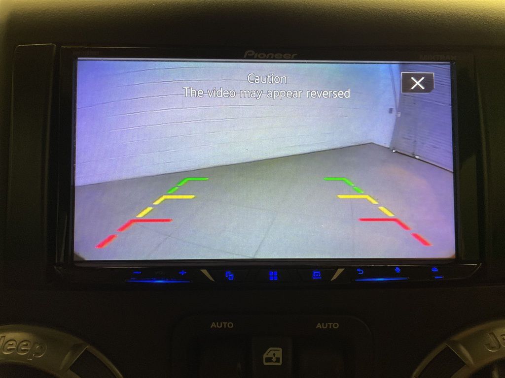 Used 2018 Black Jeep Unlimited Sahara image 16