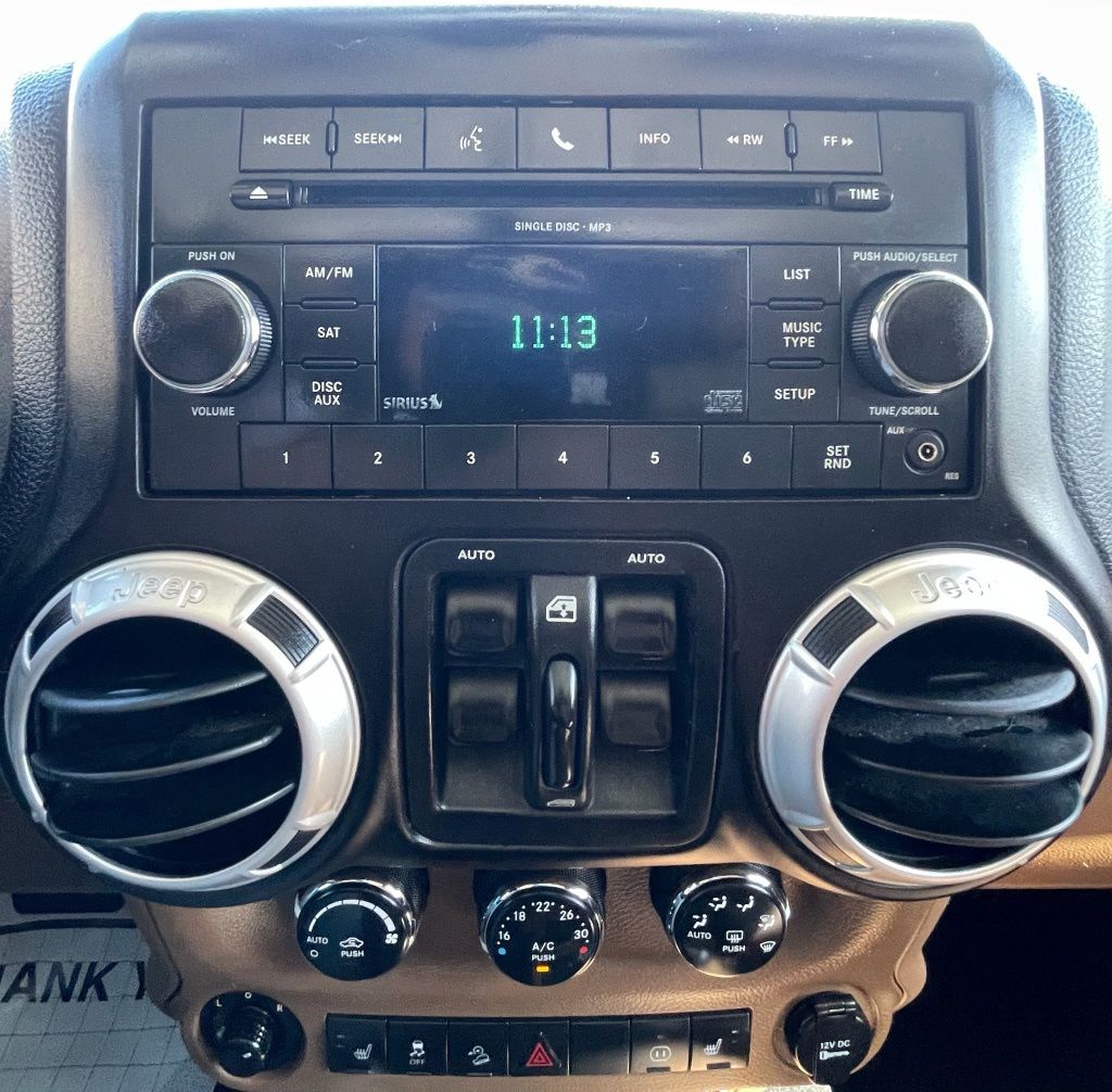 2011 Jeep Wrangler Unlimited Sahara White at Emmons Autoplex