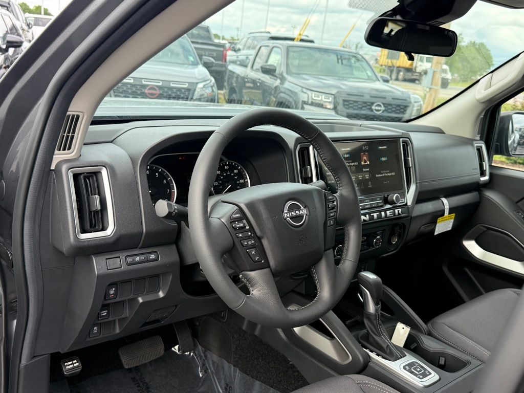 View vehicle photo 3