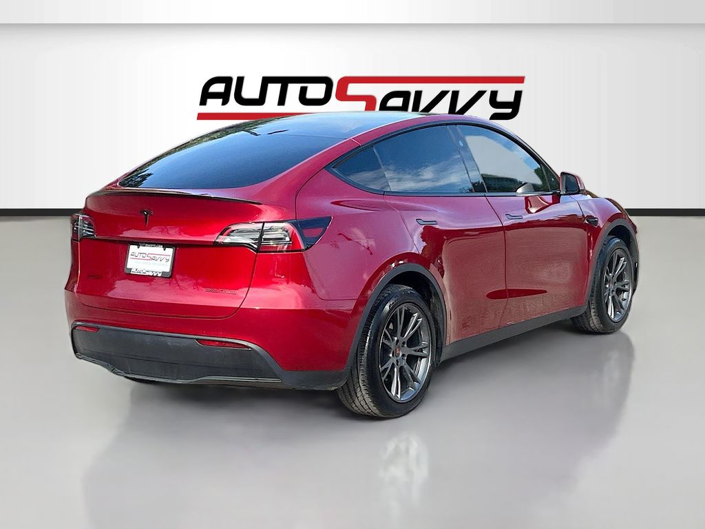 2025 Tesla Model Y Long Range Red at AutoSavvy Houston Northwest