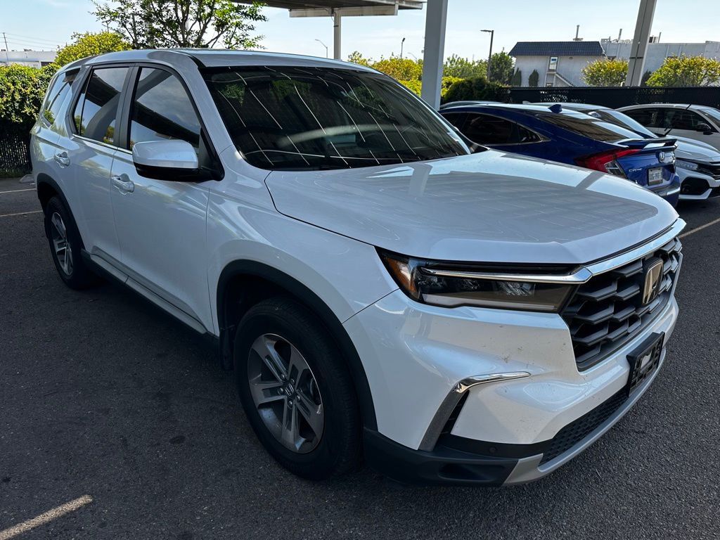 View vehicle photo 7