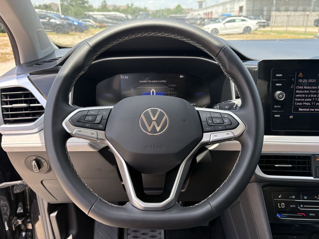 2025 Volkswagen Taos 1.5T SE Black at DeMontrond Automotive Group