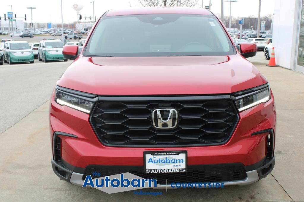 View vehicle photo 2