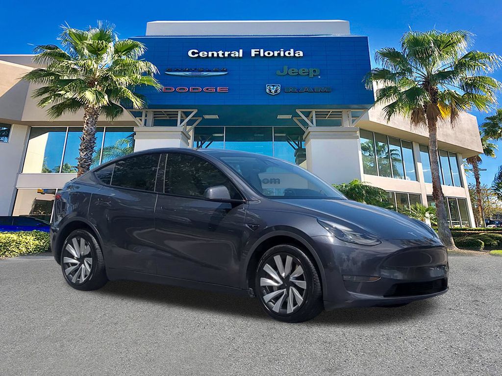 Used 2024 Tesla Model Y Long Range with VIN 7SAYGDEE8RA282705 for sale in Tampa, FL