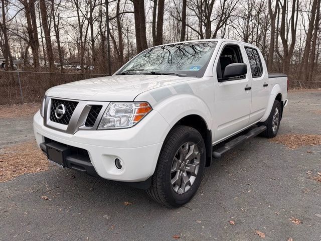 Glacier White 2020 Nissan Frontier SV Crew Cab 4WD Pickup Truck Four-Wheel Drive 9-Speed Automatic
