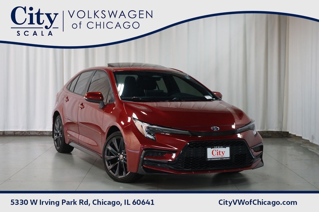 Red (Ruby Flare Pearl) 2025 Toyota Corolla Hybrid Sedan All-Wheel Drive Continuously Variable Transmission