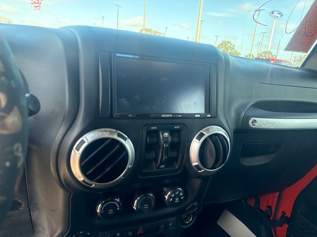2015 Jeep Wrangler Unlimited Sahara Orange at Emmons Autoplex