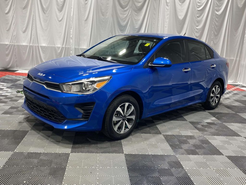 Sporty Blue 2023 Kia Rio S FWD Sedan Front-Wheel Drive Continuously Variable Transmission