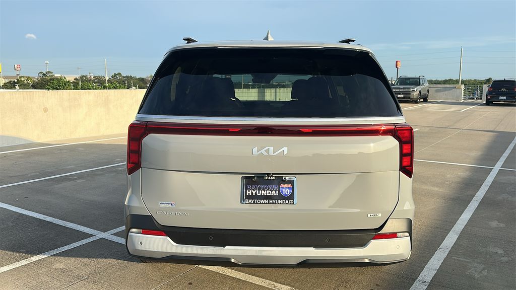 2026 Kia Carnival Hybrid EX White at Shottenkirk Kia Fort Bend