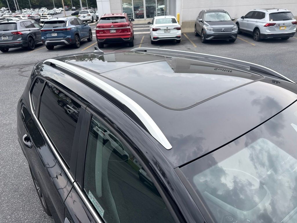 2025 Volkswagen Taos 1.5T SE Black at Sutliff Volkswagen