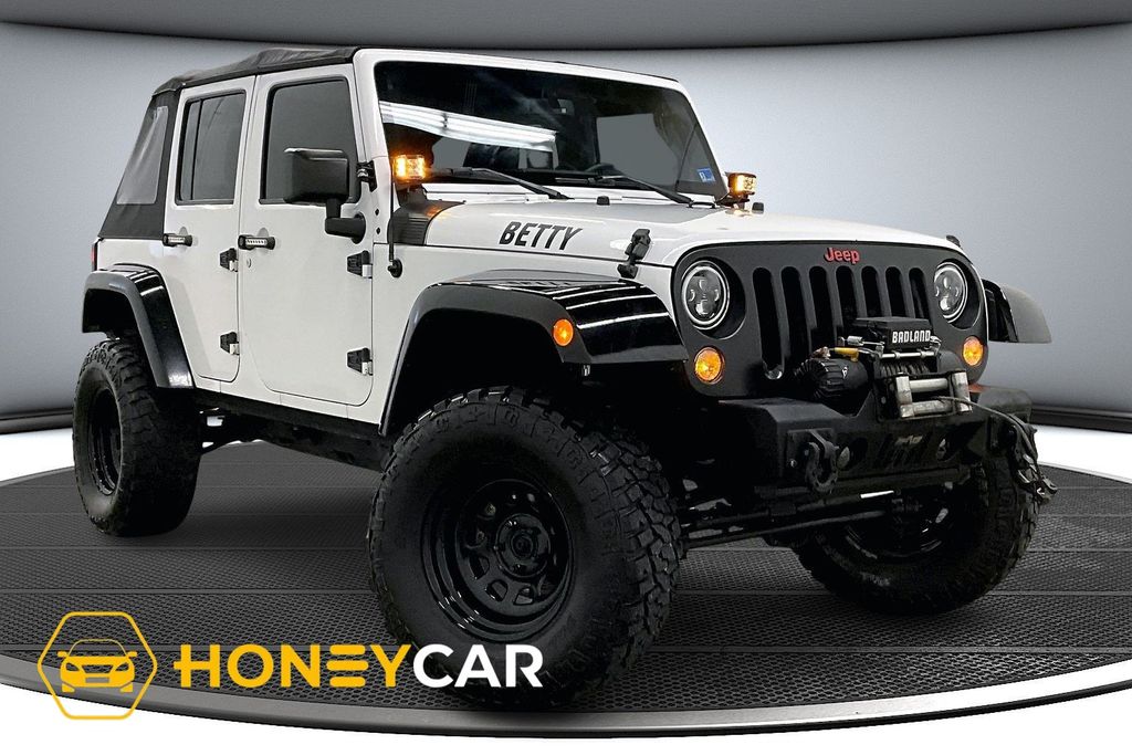 Bright White Clearcoat 2016 Jeep Wrangler Unlimited Sport S 4WD SUV / Crossover Four-Wheel Drive 6-Speed Manual