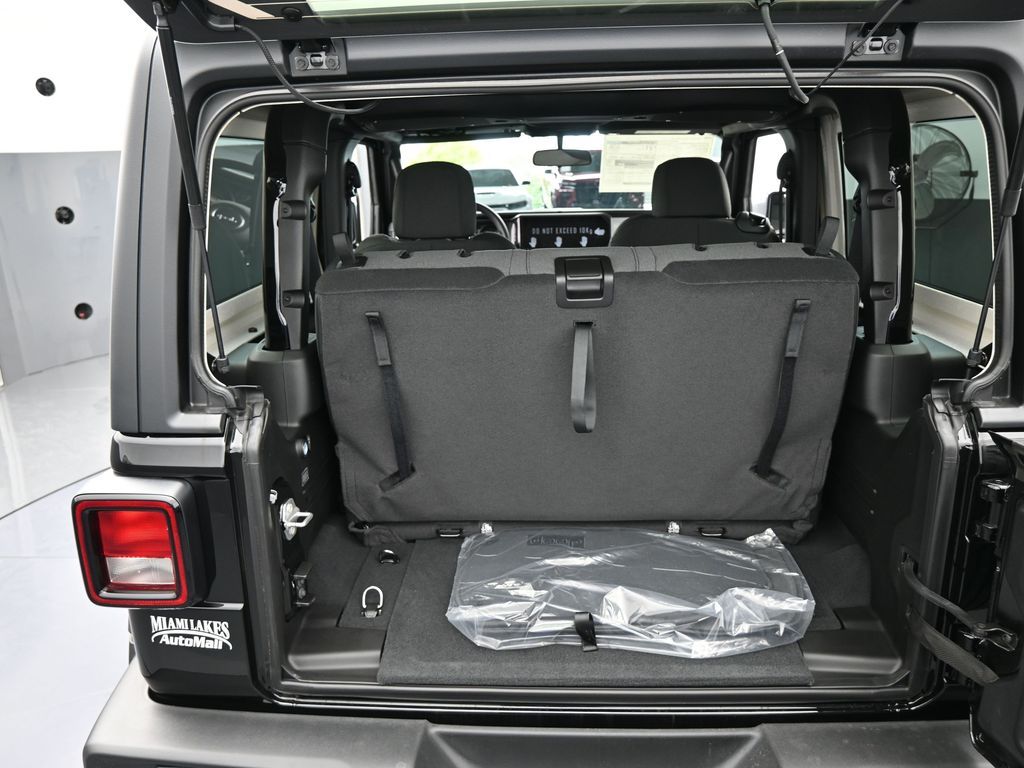 New 2026 black clearcoat Jeep Sport image 29