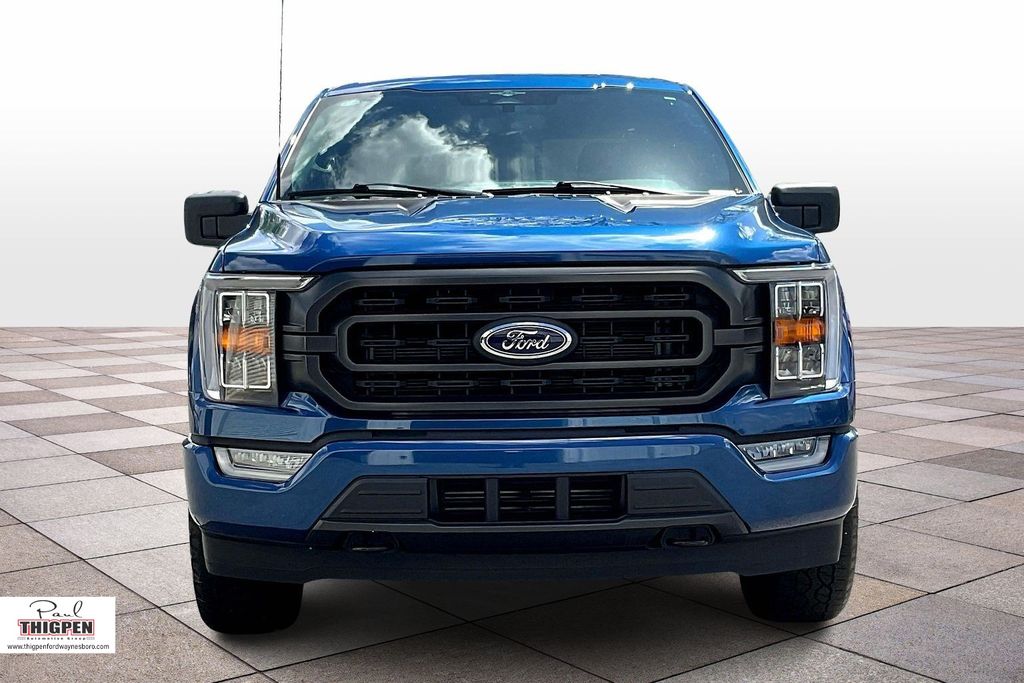 View vehicle photo 3