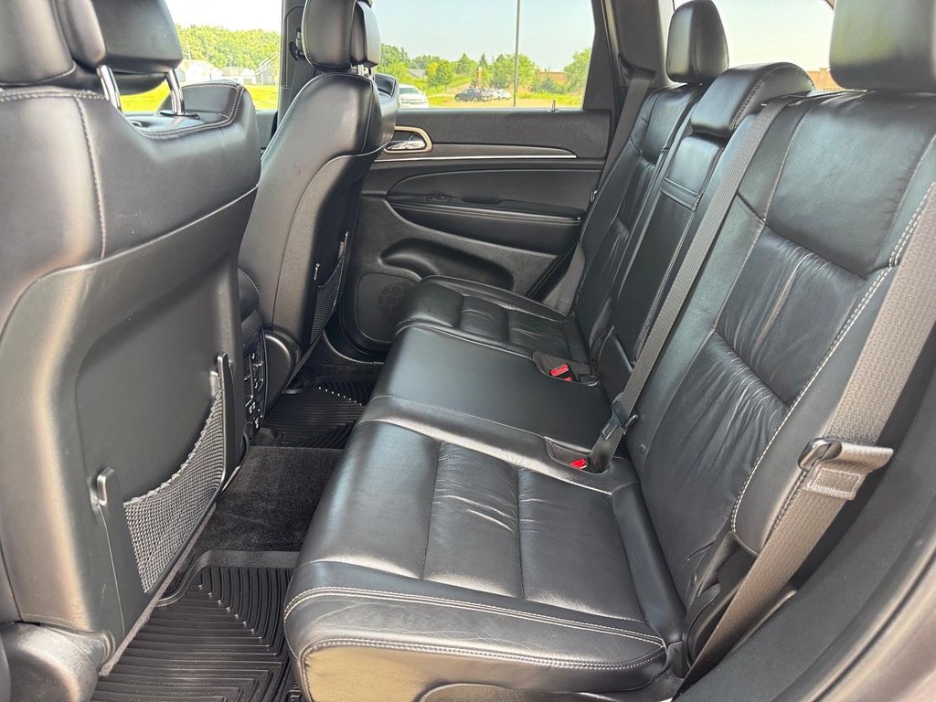 Used 2015 Granite Crystal Metallic Clearcoat Jeep Limited image 9