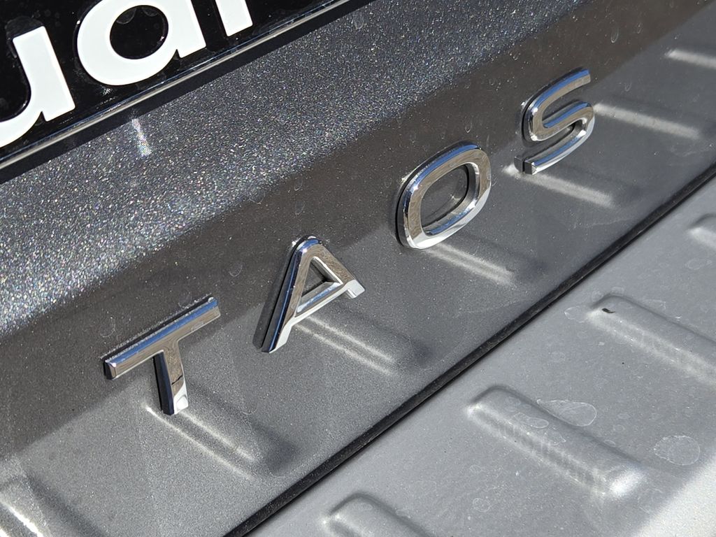 used 2023 Volkswagen Taos car, priced at $18,484