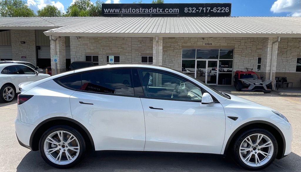2023 Tesla Model Y Long Range White at River Oaks CDJR