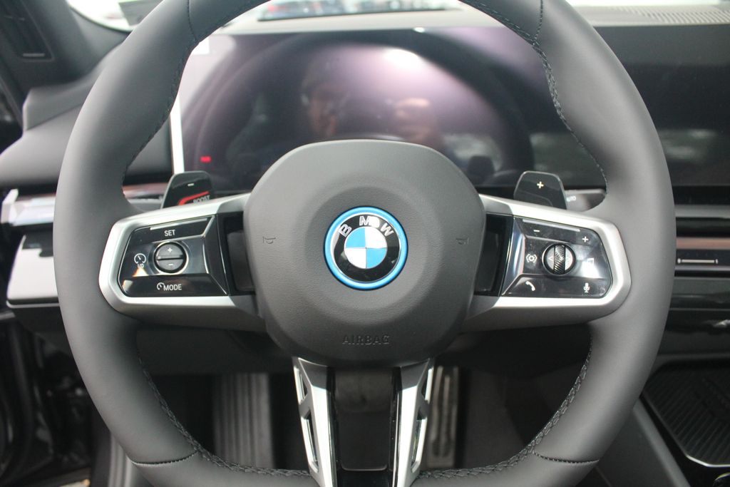 2026 BMW 5 Series 550e - Photo 15