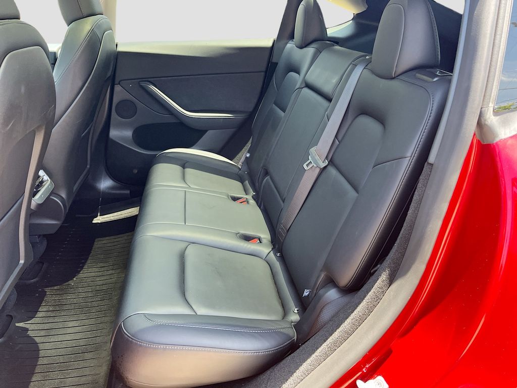 2024 Tesla Model Y Long Range Red at Ultimate Motorsports