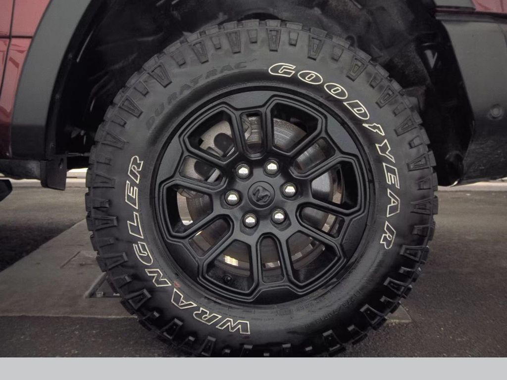 2025 Delmonico Red Pearlcoat Ram 1500 Rebel 4X4 Truck