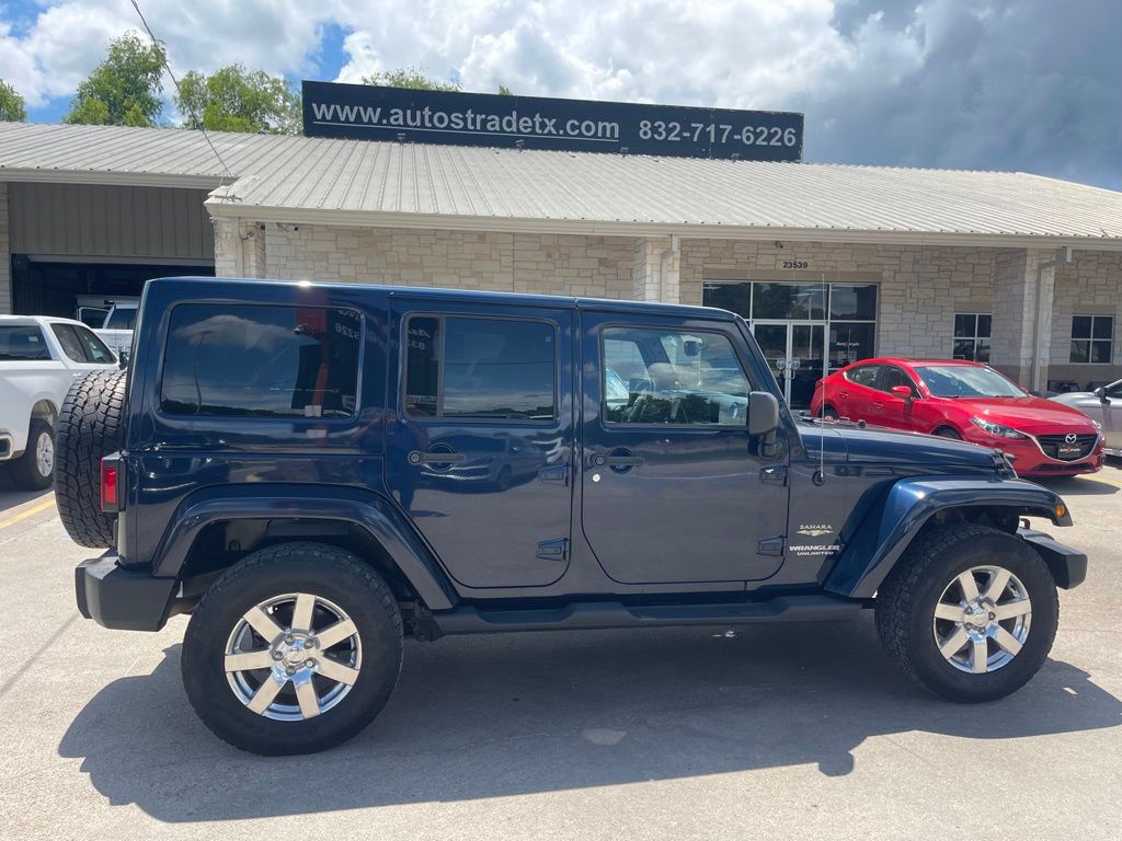 2013 Jeep Wrangler Unlimited Sahara Blue at Emmons Autoplex