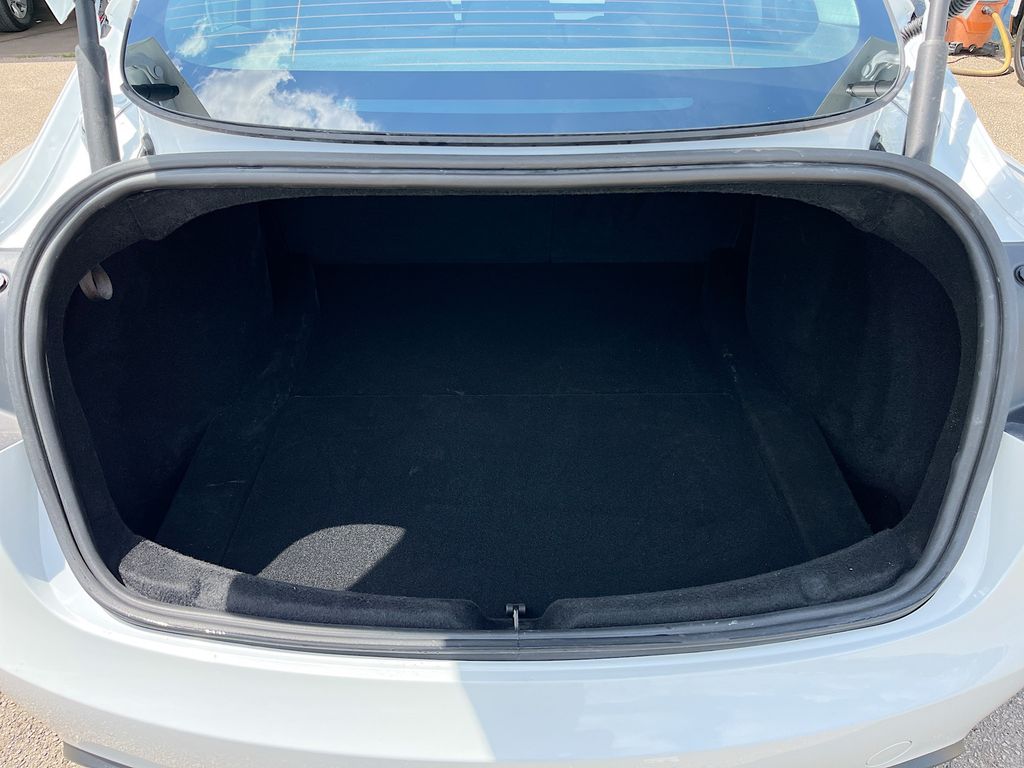 2025 Tesla Model 3 Long Range White at AutoSavvy Houston Northwest